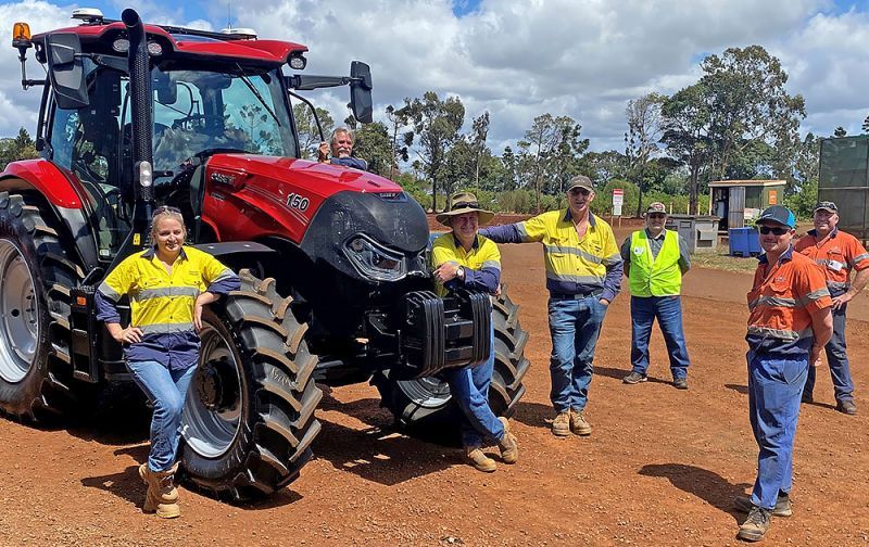 A group of farmers and agronomists standing in a field, highlighting coastal farming initiatives