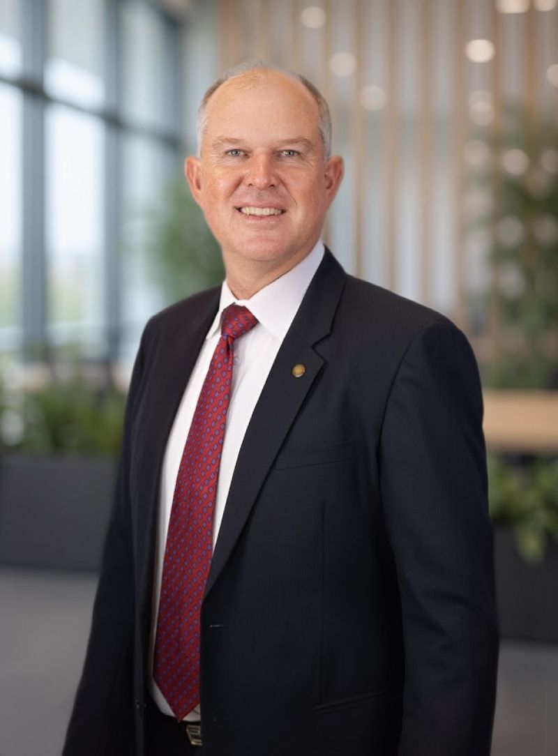 Head and shoulders shot of the Honourable Tony Perrett, Minister for Primary Industries. 