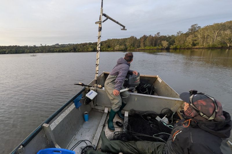 A commercial fisher on a net vessel set to deploy a trap net